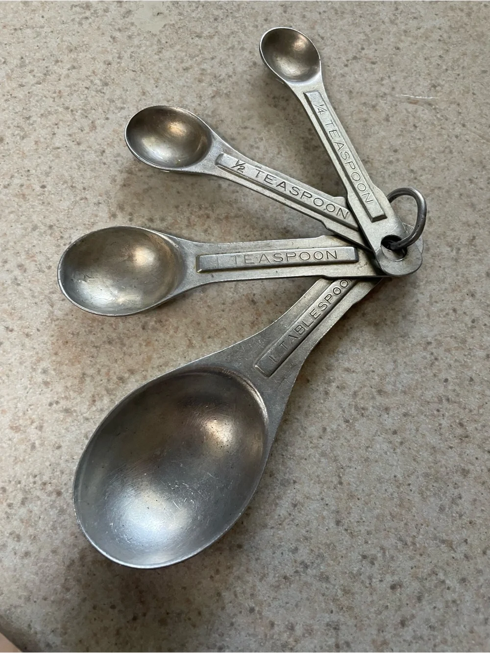 Vintage U.S.ST'D Aluminum Metal Measuring Spoons Oval Nesting Set of 4 on Ring
